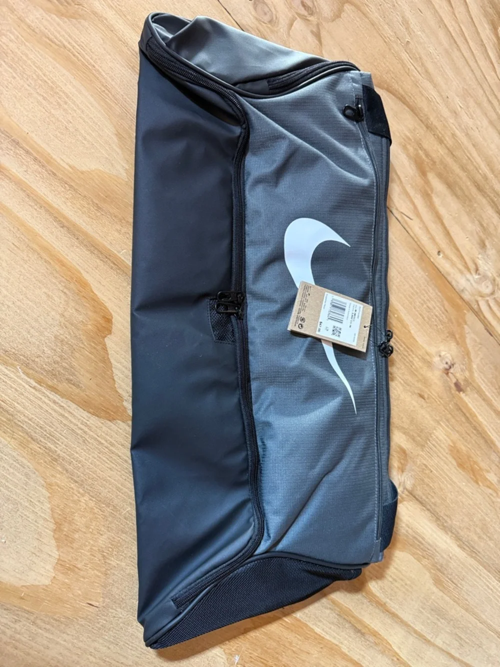 Nike Black and Gray Duffel Bag with White Swoosh
